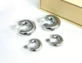 Silver chunky C-shaped hoop earrings set with removable pearl backs for women fashion. - C Shape Smooth Style / 6x20mm / Steel