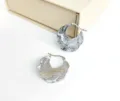 Silver stainless steel textured hoop earrings with retro design for women fashion jewelry. - Vintage Textured Irregular Earrings / Leaf-Shaped Steel