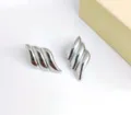 Silver metallic layered wave earrings, trendy geometric fashion jewelry for women daily wear. - Wings Wave (Silver Tone) / Silver