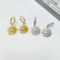 Stainless steel sun charm hoop earrings in gold and silver, trendy geometric daily jewelry. - Sun Pendant Style / Gold