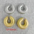 Trendy 10x30mm thick hoop earrings with textured ribbed design in gold and silver finish. - Ribbed Ear Clip / Gold