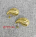 Gold stainless steel ribbed teardrop stud earrings, stylish crescent design, 18x32mm. - Water Drop Spiral / Gold