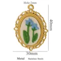 Pendentif broderie ovale en acier inoxydable avec cadre floral vintage, taille 40x30mm. - Style Ovale Fleur Bleue Bordure Festonnée Rétro (14) / 40x30mm