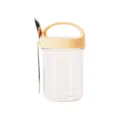 Tasse de petit-déjeuner en verre transparent avec couvercle jaune et cuillère pour avoine. - Jaune