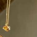 Retro gold-colored chain necklace with yellow marquise stone pendant for daily wear. - Bright yellow