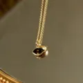 Vintage gold chain necklace with dark teardrop pendant, elegant minimalist clavicle chain. - Yellow-Green