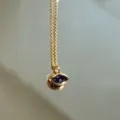 Gold necklace variant with purple gemstone eye pendant, simple and elegant daily jewelry. - Purple