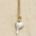 Gold-plated chain necklace featuring a white shell conch pendant, elegant everyday jewelry piece. - Beige Conch