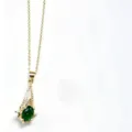 Gold-tone travel style clavicle necklace with green gemstone and delicate chain for women. - Emerald Teardrop Rhinestone Pendants