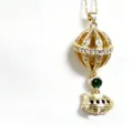 Gold-plated hot air balloon airship pendant necklace with sparkling zirconia and green gemstone. - Double-Layer Globe & Spaceship Gemstone Pendants