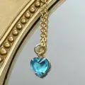 Schmuckstück Halskette mit blauem Herz Anhänger, elegant und modisch für stilvolle Damen. - Blau Gold