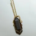 Natural crystal hexagonal column necklace with gold chain, elegant double-terminated pendant. - Black