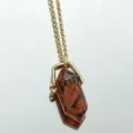 Natural crystal double terminated hexagonal column pendant necklace with gold chain clasp. - Coffee