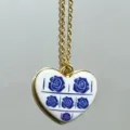 Gold-tone chain necklace with blue and white floral enamel heart pendant for fashion daily. - Blue Rose Heart