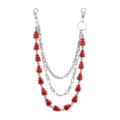 Close up detail shot of a multi-layer hip hop pants chain with red money bag charms and silver. - Red