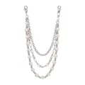 Detailed view of multi-layer metal pants chain with sports ball beads and secure clasps. - Iridescent Soccer Style