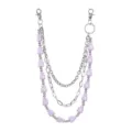 Detail shot of the multi-layer hip-hop pants chain with purple money bag charms and metal links. - Light Purple