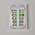 Detailed view of 24pcs press on nails featuring cute floral leaf bee and ladybug 3d designs. - 30 Pieces/Box (XS/S/M)