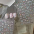 Detailed view of 5D stereoscopic macaron bow nail art stickers with cute jelly designs. - Sweet Bow Star Style (CO-591)