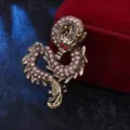 Broche de dragón retro con diamantes de imitación relucientes, diseño vintage para abrigo. - Diamante Champaña