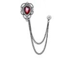 Vintage gotische tropfenförmige rote Kristall-Broche mit doppelter Kette und Quaste. - Roter Edelstein (Schwarzbasis)