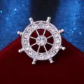 Exquisite ship wheel brooch detailed with sparkling crystals, perfect for stylish suits. - Silver with White Rhinestone / Silver