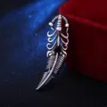 Vintage hollow silver feather brooch for men, detailed gothic style lapel pin accessory. - Antique Silver
