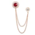 Detailed view of vintage rose gold double chain brooch with red crystal and dazzling rhinestones. - Golden Red Gem