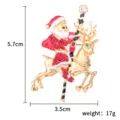 Weihnachtsmann Rentier Brosche Pin, festlicher Kristall Strass Legierung Schmuck für Winter. - Weihnachtsmann reitet Rentier elektrisches Spielzeug
