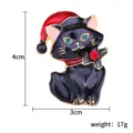 Weihnachten schwarze Katze Brosche Stift mit rotem Weihnachtshut und gruener Stechpalme. - Schwarze Katze