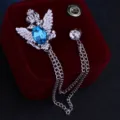Detailaufnahme der Vintage Silber Doppeladler Brosche mit blauem Kristall und Kette. - Silber Basis Seeblau Strass