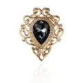 Vintage retro Hof Edelstein Brosche mit hohlem Filigranrahmen und schwarzem Tropfenkristall. - Goldbasis mit grauem Kristall