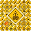 Pack of warning stickers featuring yellow hazard signs, waterproof vinyl for safety use. - Yellow Warning Style (T01043502) / 50 Sheets/Pack