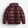 Detailed macro shot showing the glossy texture of a burgundy hooded puffer jacket for men - XS / Tops / Red Brown