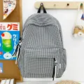 Zaino a scacchi bianco e nero con tasca frontale, esposizione accogliente - 30x13x43cm / Nero