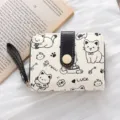 Portafoglio beige pieghevole con illustrazioni di gatti neri e chiusura a scatto - Orso Nero (Antismagnetizzazione) / Nero