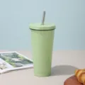 Double-walled vacuum insulated light green stainless steel tumbler with a reusable metal straw - Light Green [Black Trim]