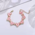 Modisches Legierung rosa Herz Armband Bonbonfarben Schmuck Detailansicht Nahaufnahme - Rosa