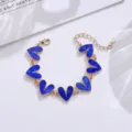 Blaues Herz Charm Armband, schicke Goldlegierung Kette mit bunten Öltropfen Details. - Blau