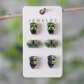 Close-up detail view of Mardi Gras colorful jester mask wooden stud earrings set. - Clown Mask Style (2334) / 3 Pairs/Pack