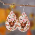 Teardrop PU leather earrings featuring a cute highland cow with pink floral crown print. - Style 850