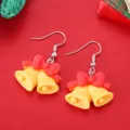 Weihnachtsglocken Ohrringe mit roten Schleifen, süßer festlicher Cartoon Schmuck für Partys. - Glocke