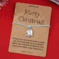 Weihnachten Wunsch Armband mit Glockenanhänger und blauer Kordel auf Kraftpapierkarte - Hellblauer Glocken-Stil (SRY298-1)