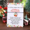 Conjunto de pulsera de deseos navideña con dije de casa y tarjeta para las fiestas. - Casa de Navidad