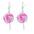 Close-up detail of the pink and white swirl lollipop pendant earrings with metal hook. - Spiral Lollipop / Pink White