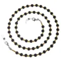Elegante kralen brillenketting zwart en goud mondkapje koord anti verloren stijlvol voor vrouwen. - Zwart