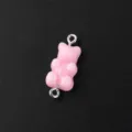 Pink resin gummy bear charm with metal loops, ideal for DIY jewelry making and crafts. - Glitter Bear (AP1004) / 10 Pieces/Pack / Solid Pink