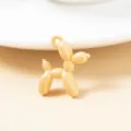 Close-up detail of the cute balloon dog alloy charm pendant for DIY jewelry making crafts. - 10 Pieces Pack / Orange Pink