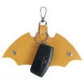 Yellow bat wing leather car key case with metal hook and Ford key for daily use - Turmeric