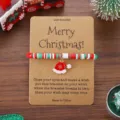 Pulsera de deseos de Navidad con colgante de gorro de Papa Noel en tarjeta kraft festiva - Gorro de Navidad